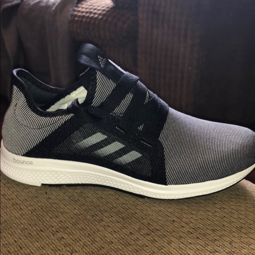 Never worn Adidas tennis shoes!